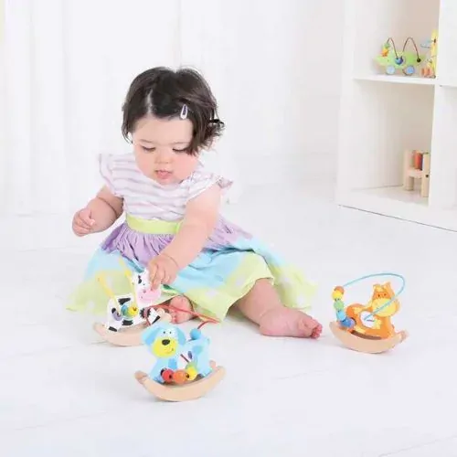 Bigjigs Baby Motorický labyrint na hojdačke Koník