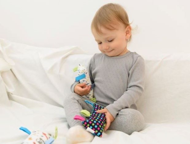 MyMoo Montessori úchopový vankúšik Lentilky